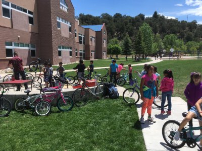 Kids enjoying outdoor bike project
