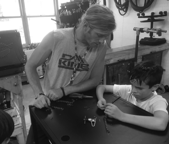 Robby working with a student